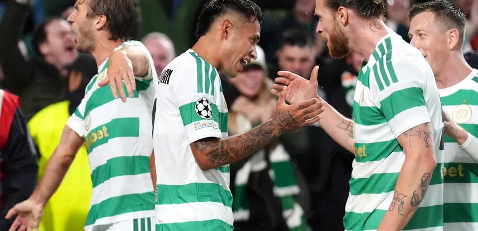 Celtic players celebrating during Champions League match