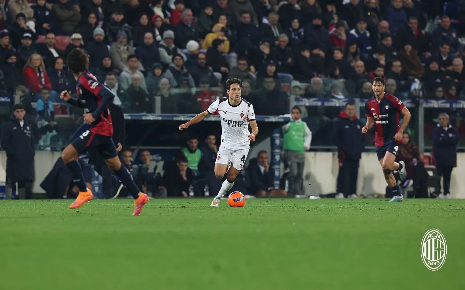 AC Milan player dribbling during Serie A match