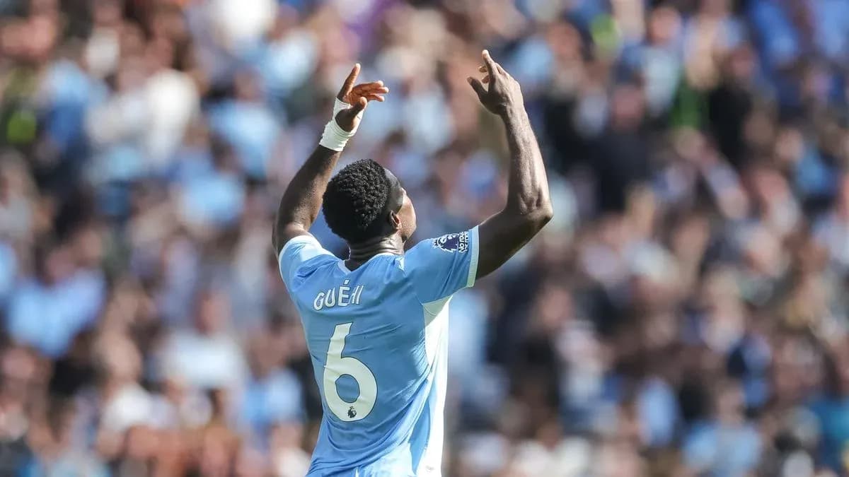 Player celebrating with arms raised during match