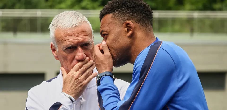 Coach and player discussing strategies during training