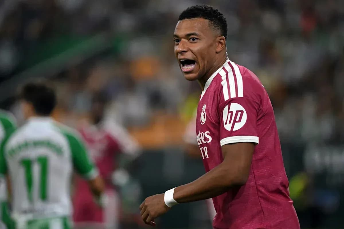 Player celebrating during match in pink kit