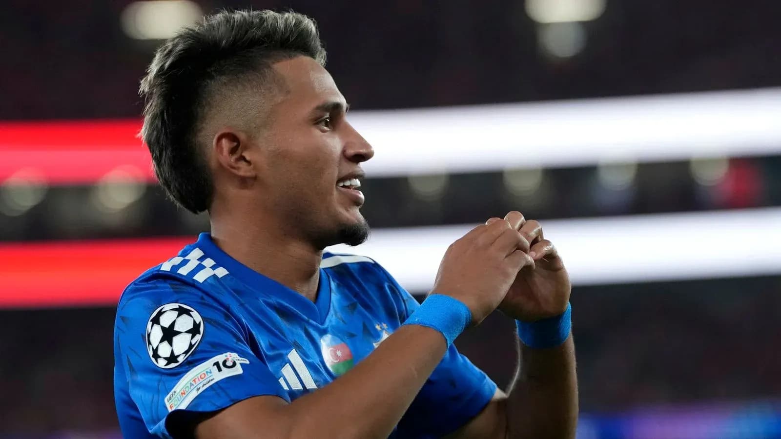 Player celebrating during a Champions League match