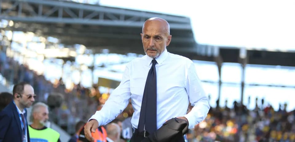 Coach walking on the sidelines during match