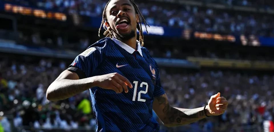Player celebrating after scoring for France in match