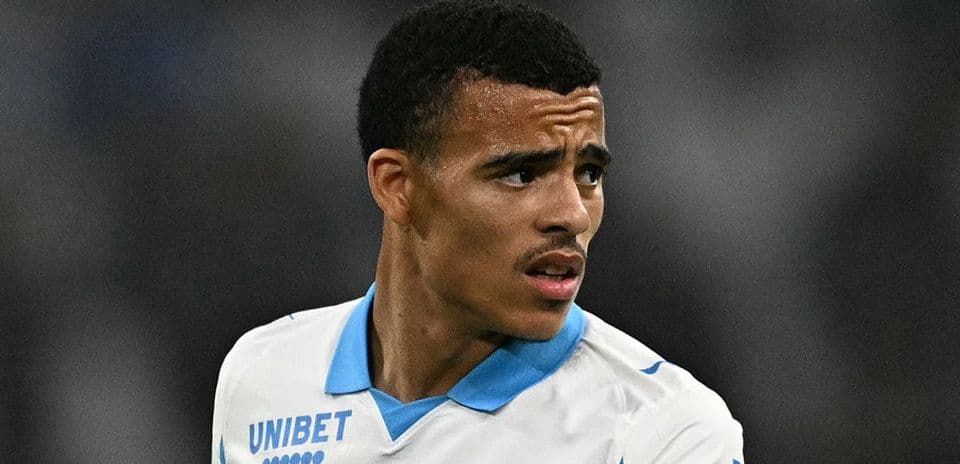 Player wearing a white jersey with blue details
