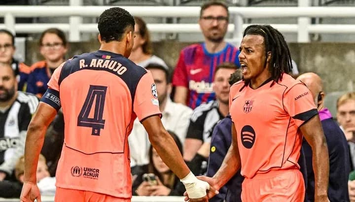 Two players celebrating a goal in match