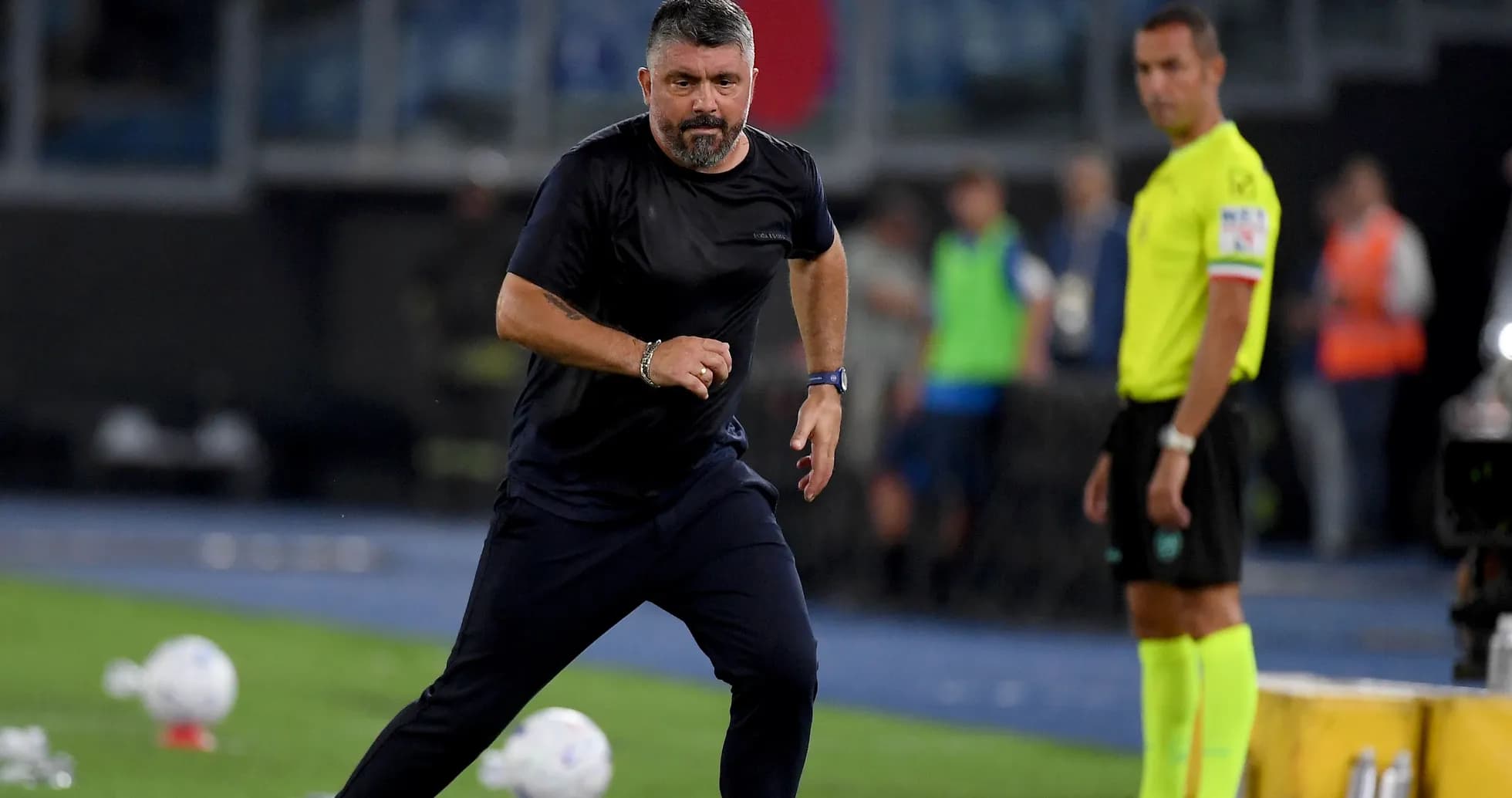 Coach running along the sideline during match