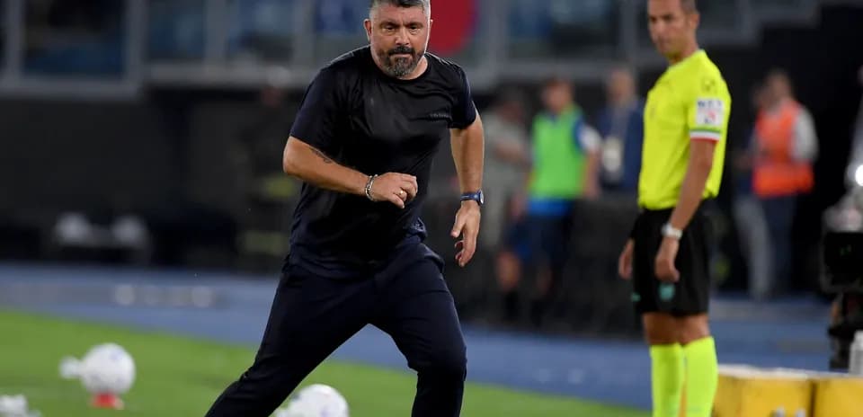 Coach running along the sideline during match