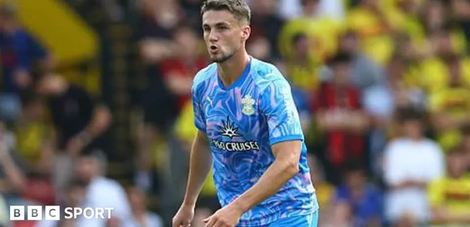 Player in colorful kit during match action