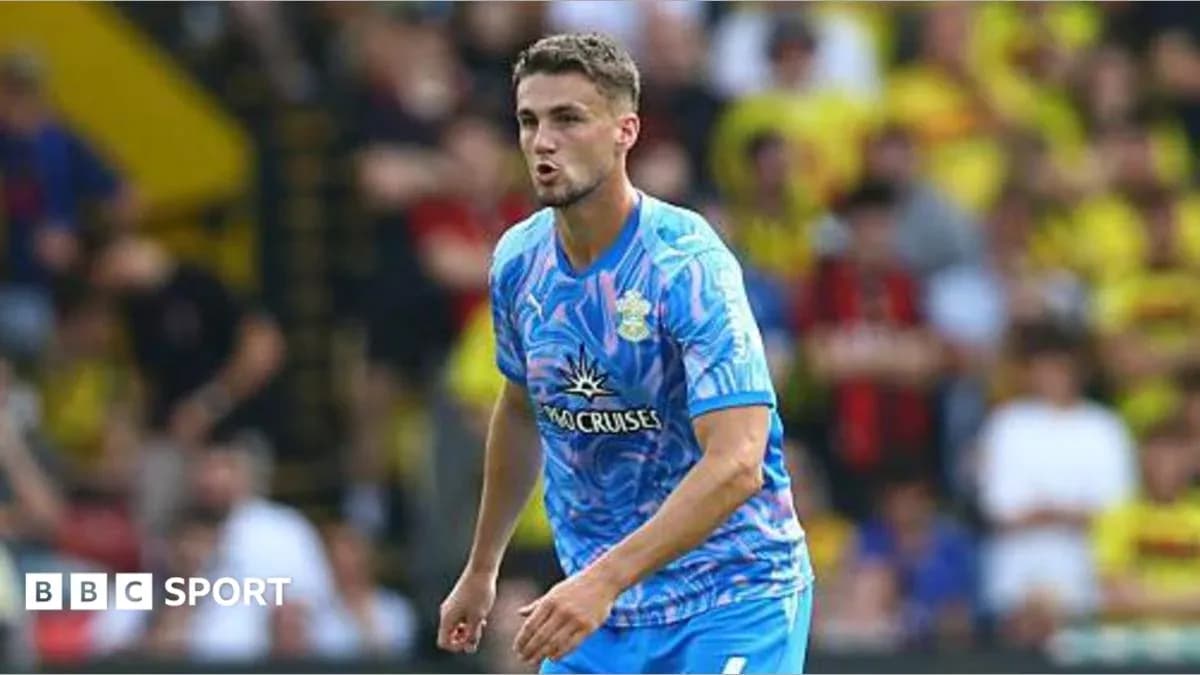 Player in colorful kit during match action