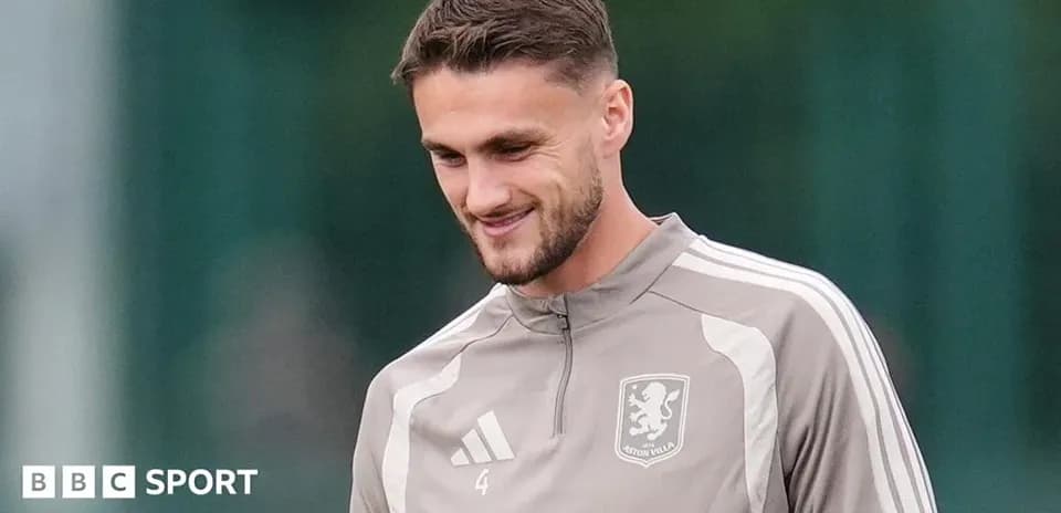 Player smiling during Aston Villa training session