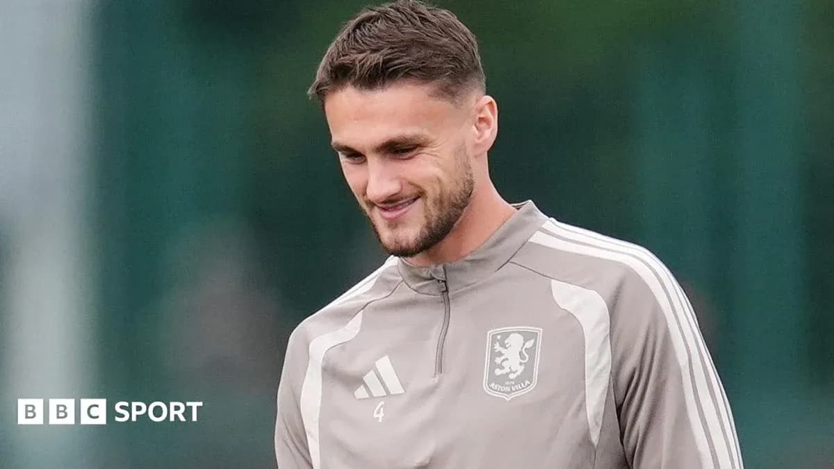 Player smiling during Aston Villa training session