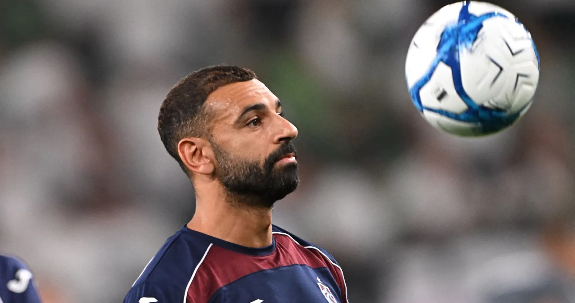 Player juggling a soccer ball during training session