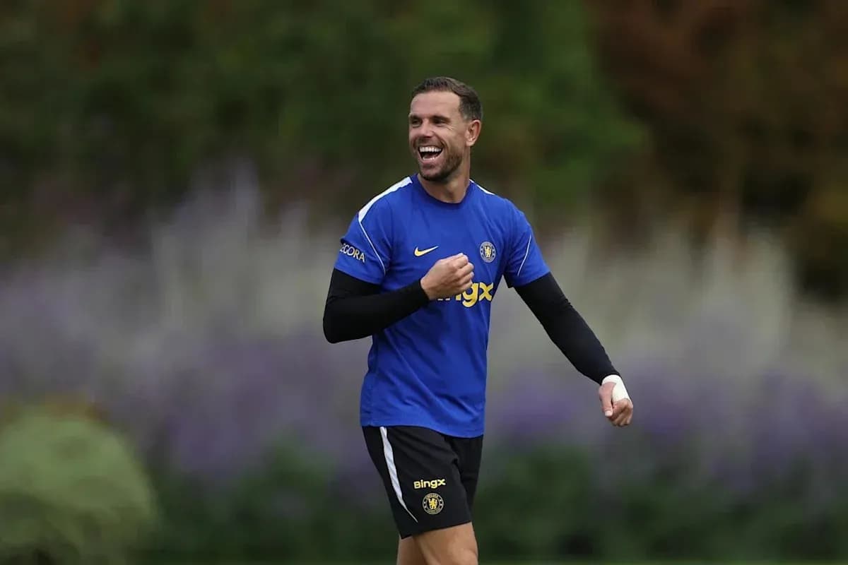 Player smiling during training session in blue kit