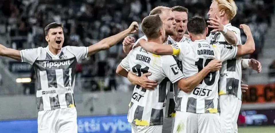 Players celebrating a goal during match