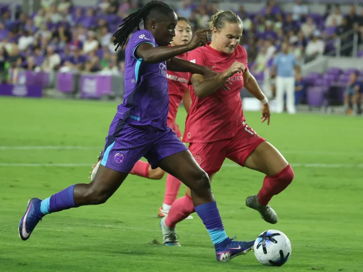 Boston Legacy W player dribbling against Orlando Pride W