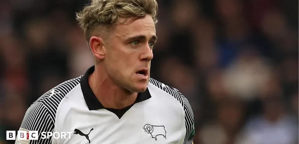 Player in Derby County kit during a match