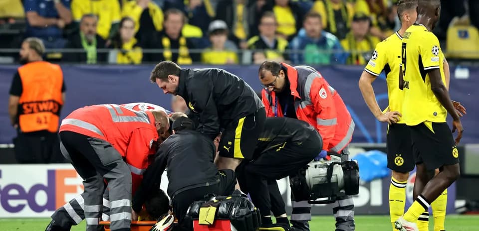 Medical team attending to player on the field