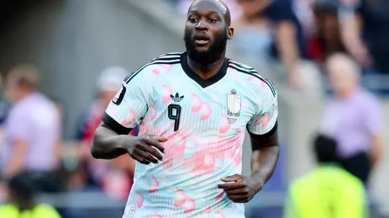 Player in colorful jersey running on the field