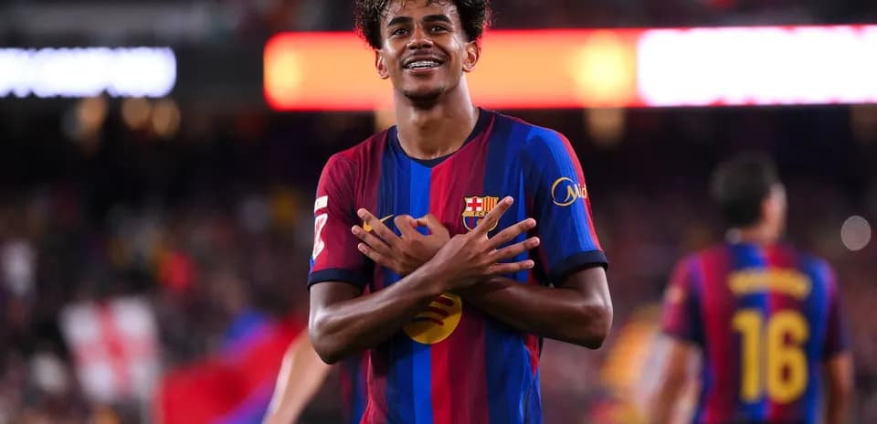 Player celebrating with arms crossed on the field