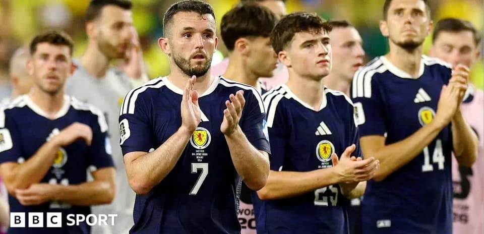 Scotland players applauding fans after match