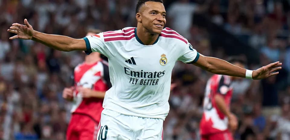 Player celebrating after scoring a goal for Real Madrid