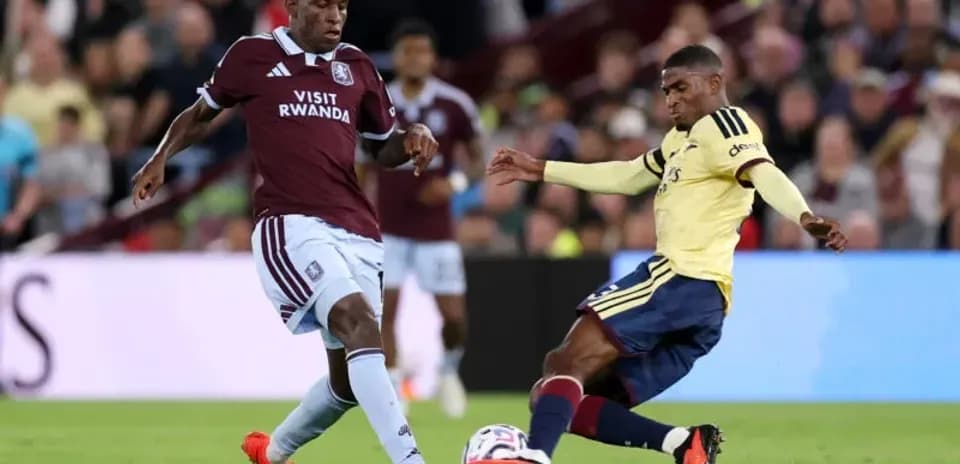 Two players competing for the ball during match