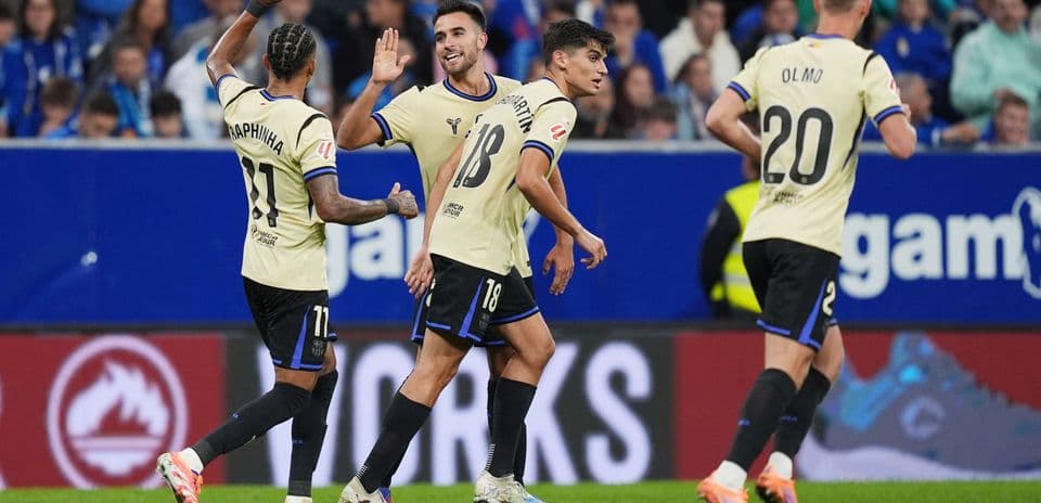 Players celebrating a goal during La Liga match