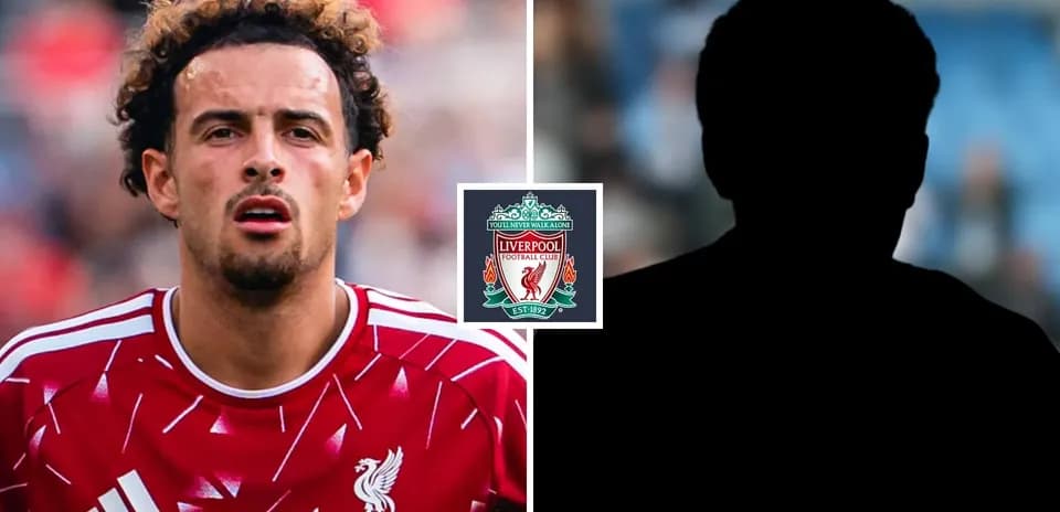 Liverpool player in red kit, silhouette on right