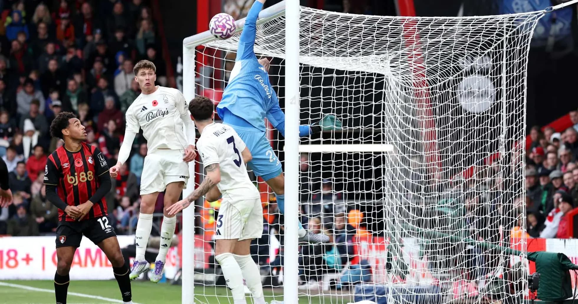 Goalkeeper making a save during Nottingham Forest match