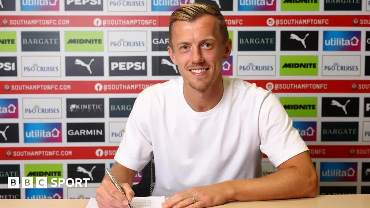 Player signing contract at Southampton FC press conference