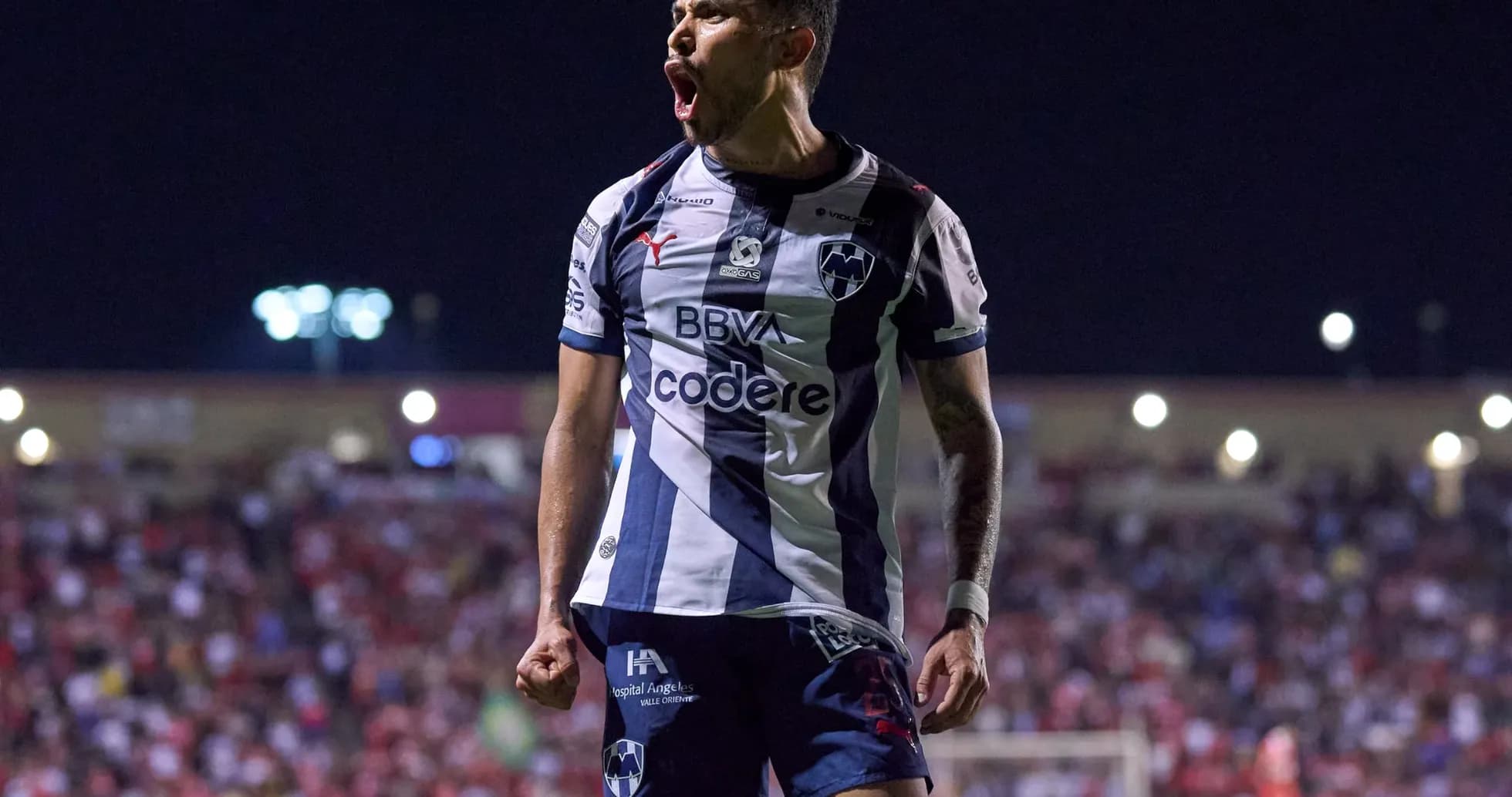 Player celebrating after scoring for Monterrey