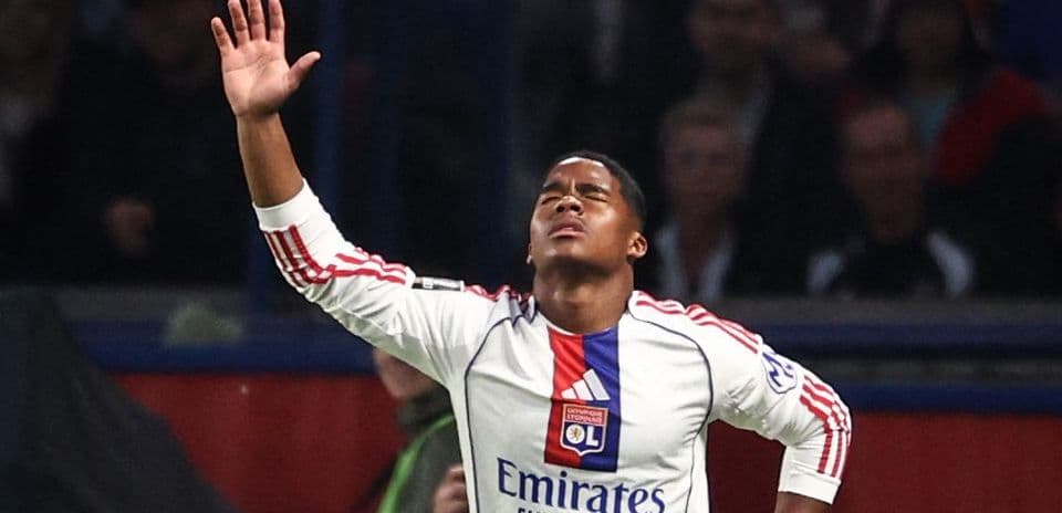 Player celebrating a goal with raised hands