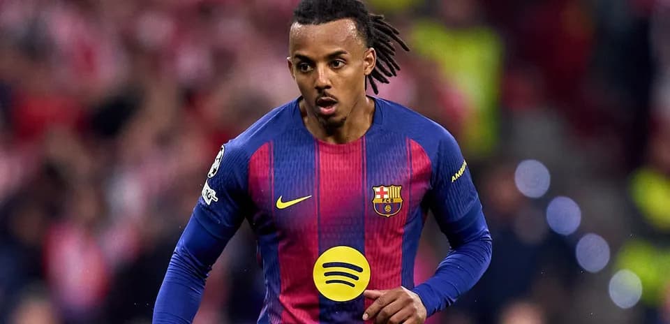 Player in FC Barcelona kit running on the pitch