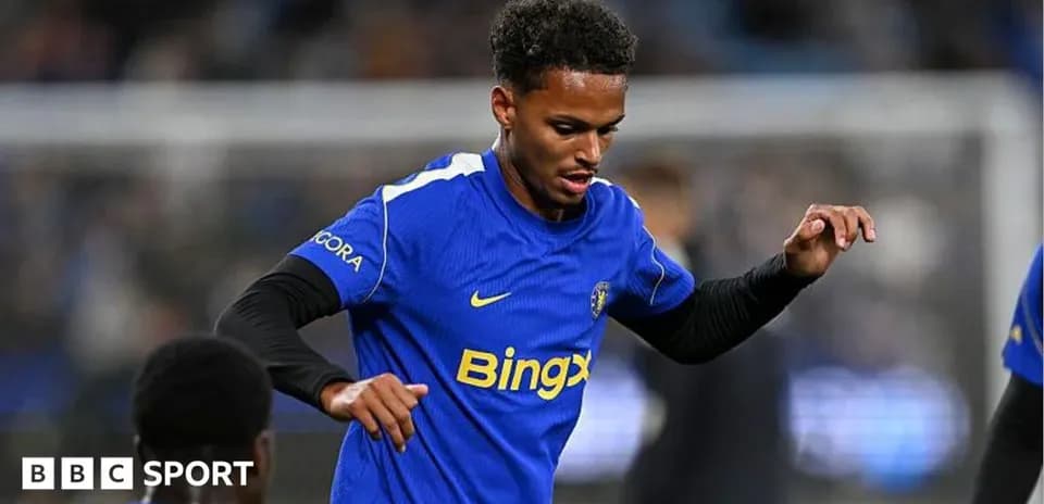 Player in blue jersey warming up before match
