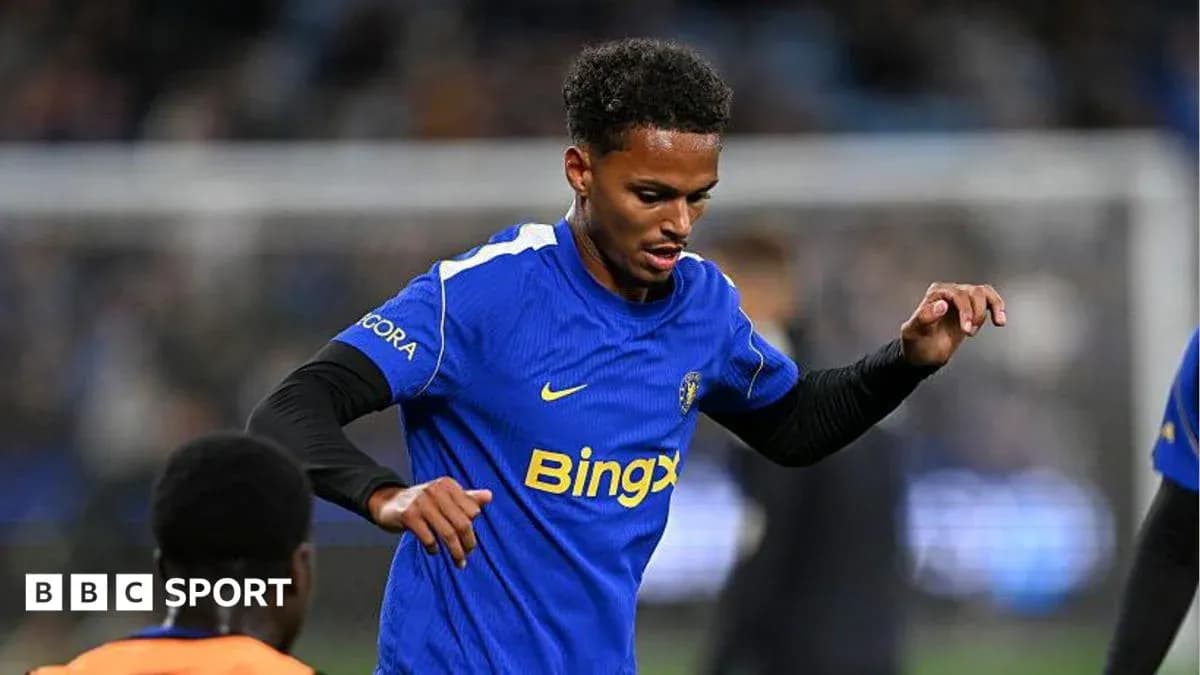 Player in blue jersey warming up before match