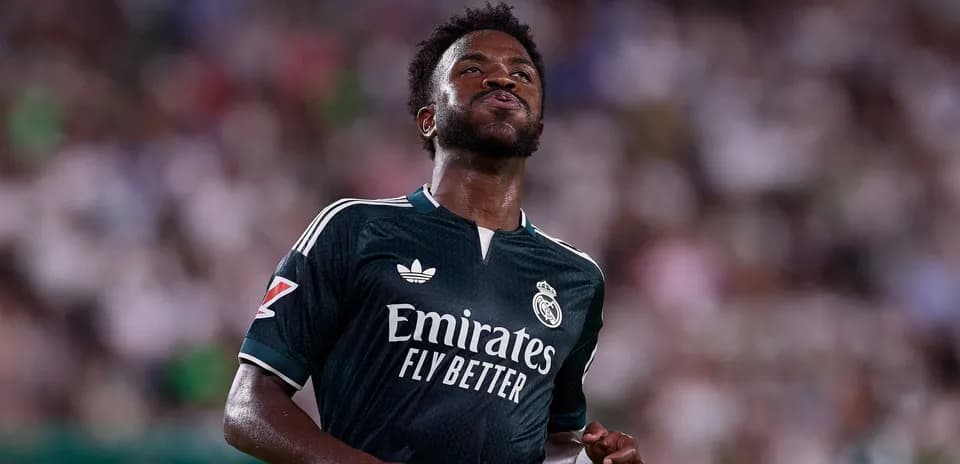 Player in Real Madrid kit during match action