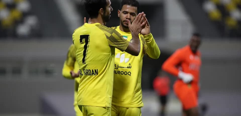 Players celebrating during U23 football match
