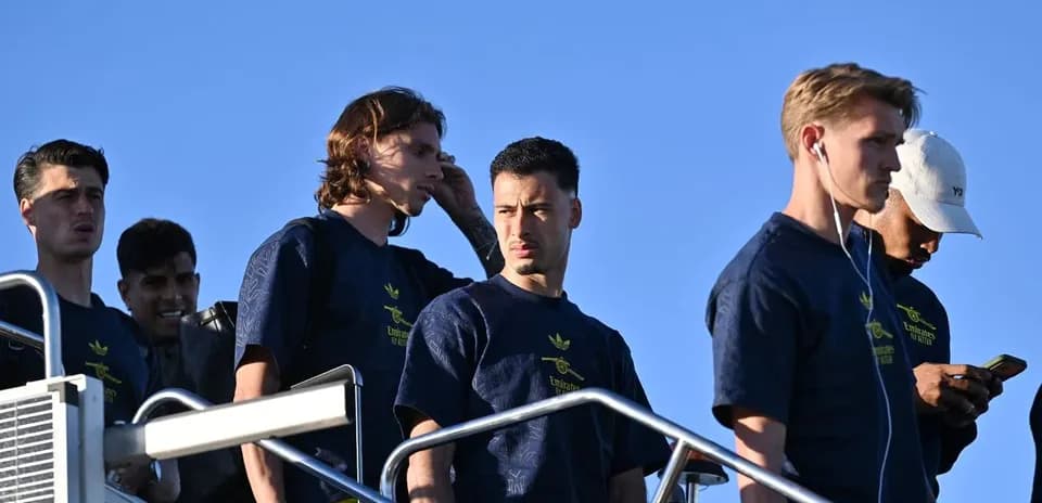 Players descending stairs during training session arrival