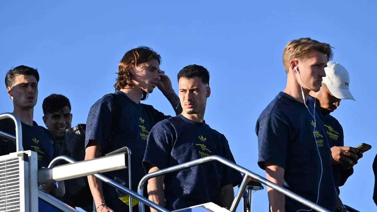 Players descending stairs during training session arrival
