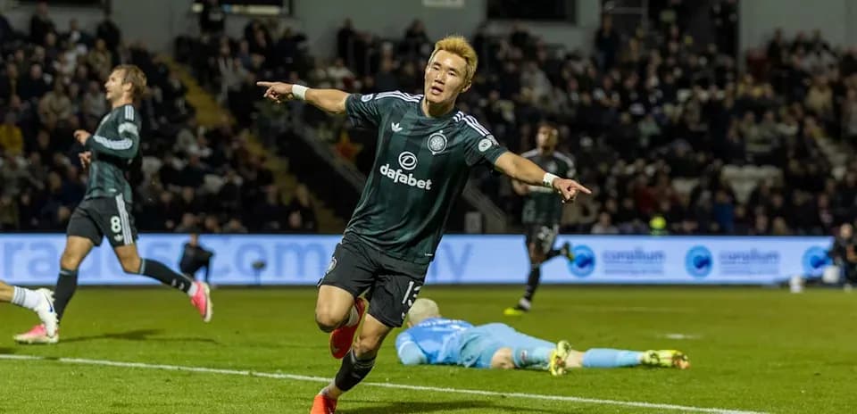 Player celebrating after scoring a goal during match