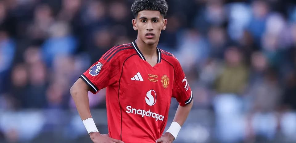 Young player in Manchester United kit during match