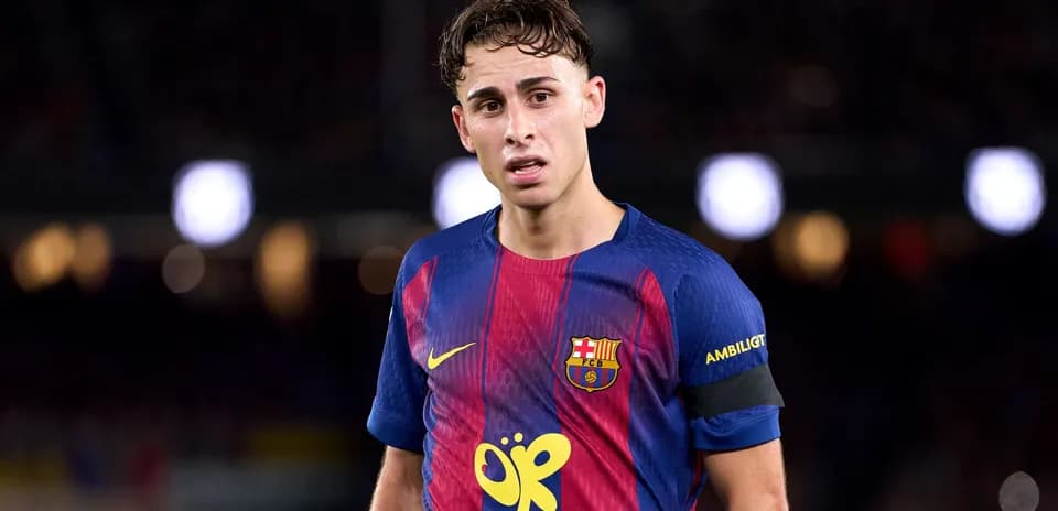 Player wearing FC Barcelona jersey on field