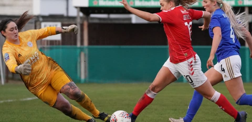 Charlton Athletic W player challenging Leicester City WFC goalkeeper
