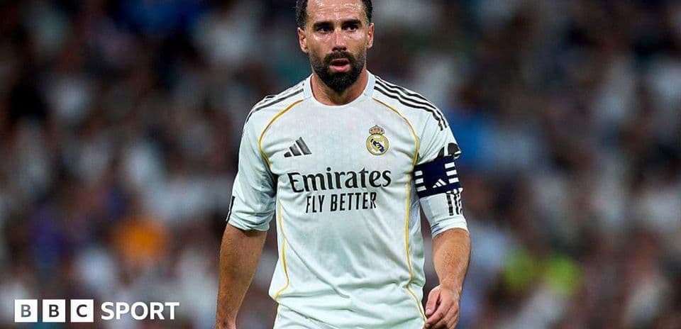 Player in Real Madrid kit during match action