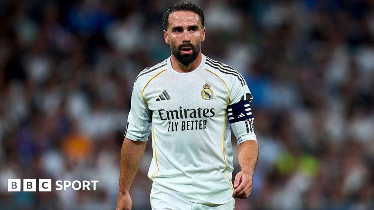 Player in Real Madrid kit during match action