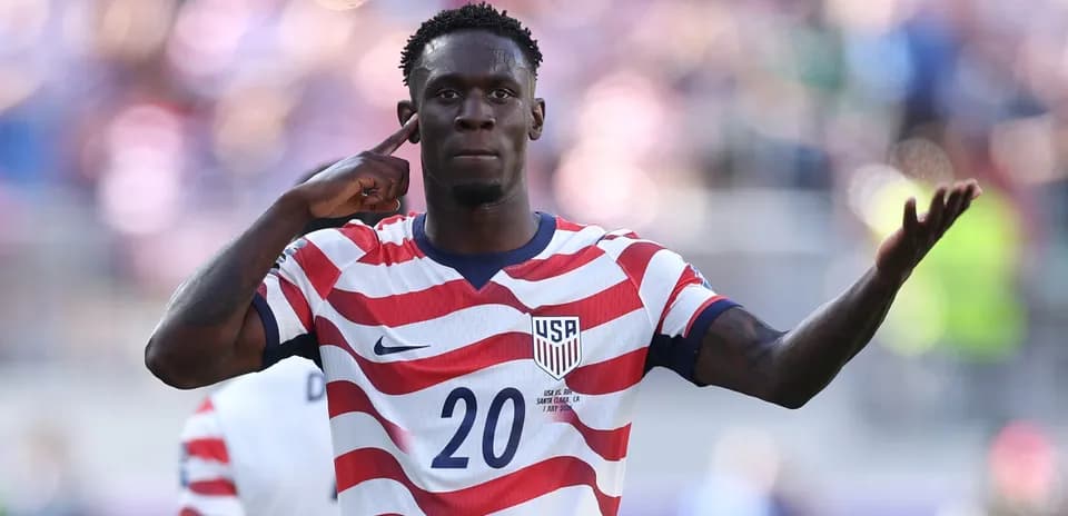 USA player celebrating after scoring a goal