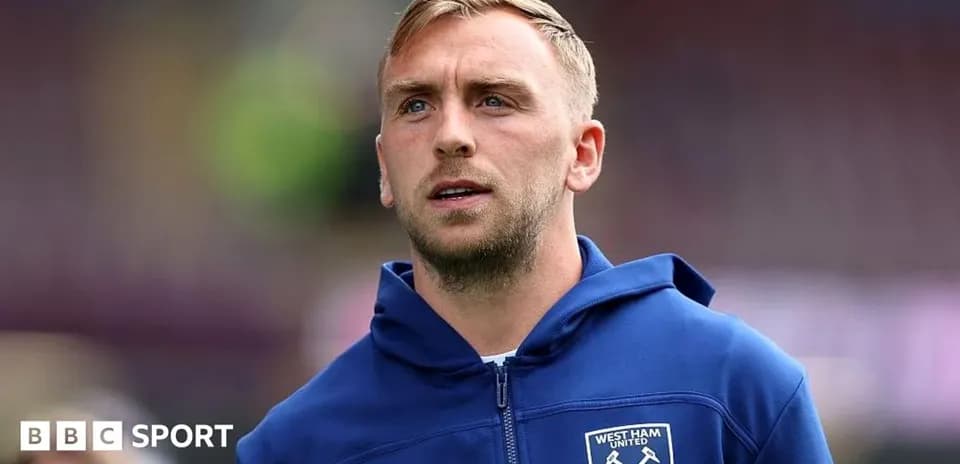 West Ham United player in team hoodie before match