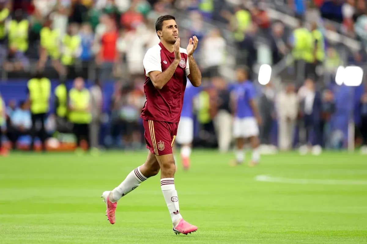Player applauding fans after the match