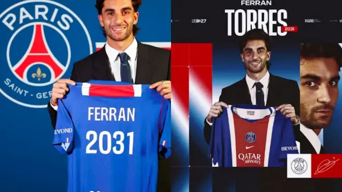 Ferran Torres holding PSG jersey during presentation